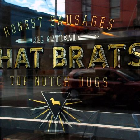 Phat Brat Restaurant, Brunswick Street, Fitzroy. Reverse Gold Leaf Gilded Window Sign.