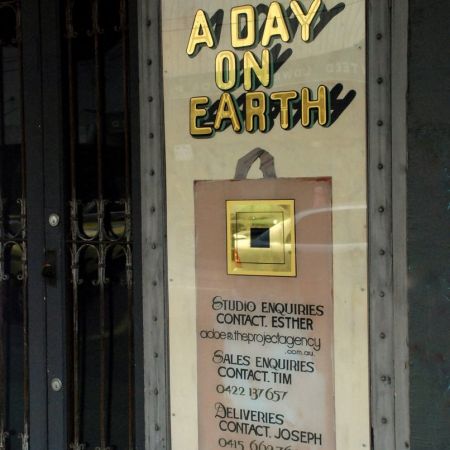 Reverse Gilded Sign With 2-tone Shading And Effects .A Day On Earth, Chapel St, Windsor, Melbourne.