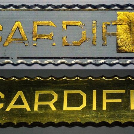 "Cardiff". Gold Leaf Restoration of Glass Plaque.